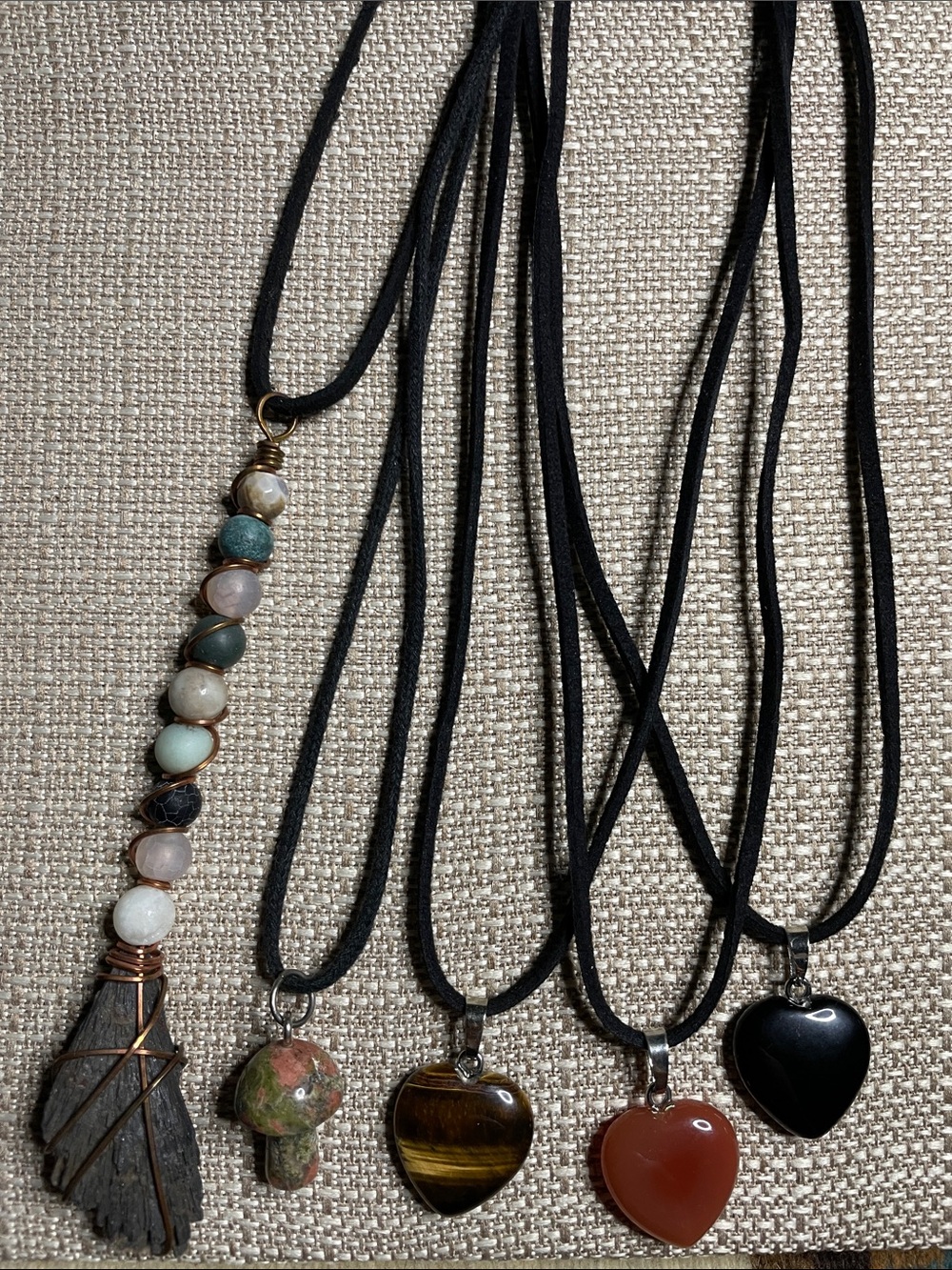 This is a lot of 5 pendants. Black Kyanite Unikite Tigers eye Carnelian Onyx